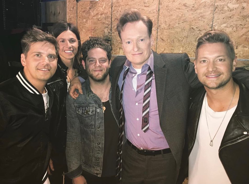 josh lovelace with bandmates and conan o brien