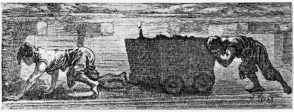 children pushing carts underground