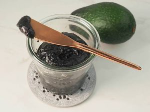 Jar of Aussie spread on table with butter knife