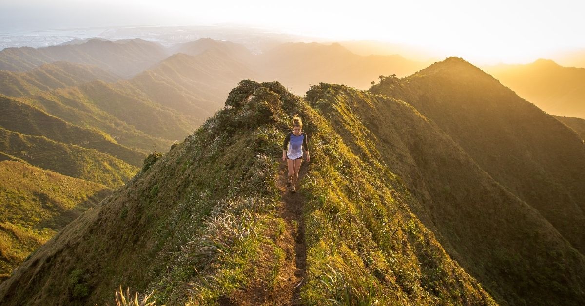 person hiking on a mountain