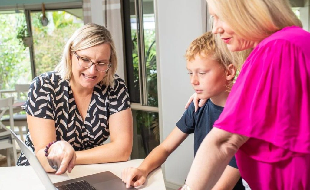 A mother and son use the Momentum online mental health platform